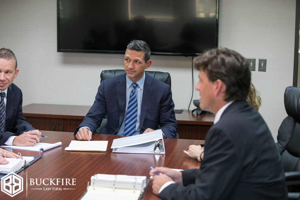 Michigan Veterans hospital malpractice lawyer discussing a settlement