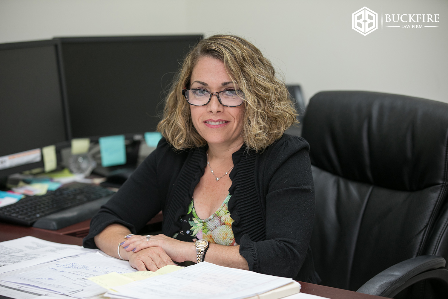 Attorney Alyssa Moss sitting at her desk