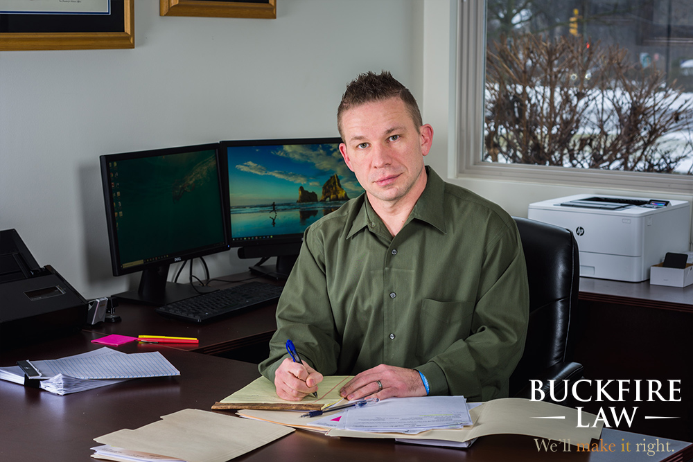 Attorney Nicolas Vesprini sitting at his desk