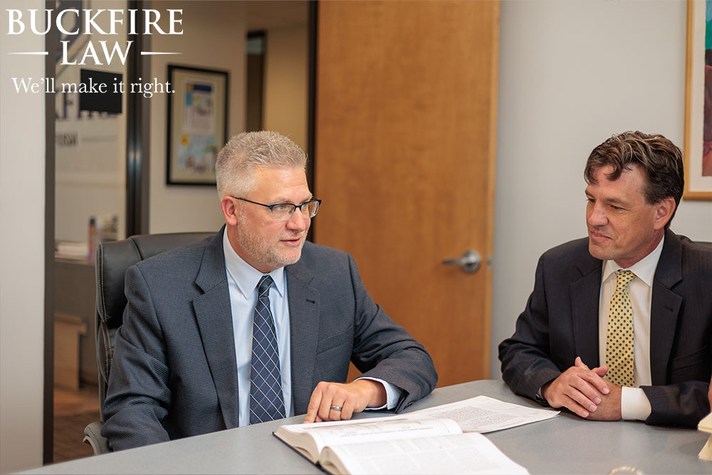 Wrongful death attorneys discussing using an autopsy in a case